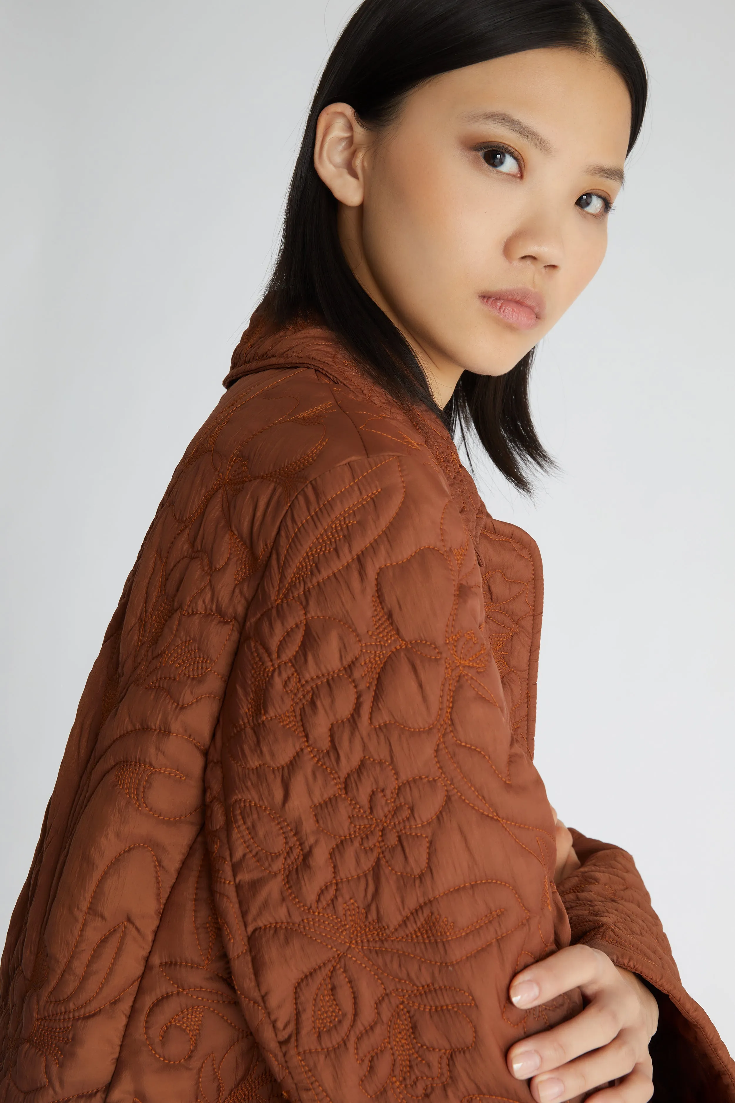 All-over floral quilted down jacket